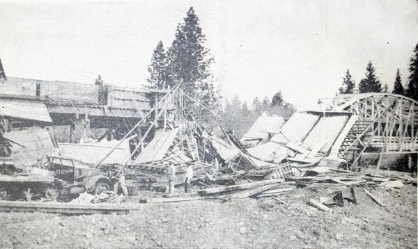 1956 newspaper photo of collapsed east fork bridge, Cave Junction, Oregon